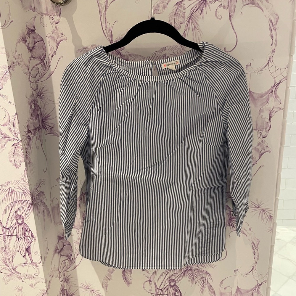 Blue and white striped crewcuts top